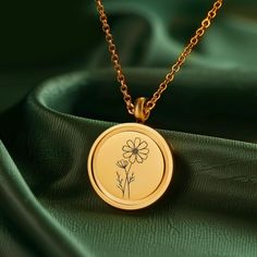 This elegant Custom Urn Necklace beautifully honors your loved one's memory. It features an engraved urn pendant that can hold a small amount of ashes, making it a heartfelt keepsake. PRODUCT DETAILS - 2 Colours Provided: Silver and Gold - 304 Stainless Steel with Gold Plating, durable, corrosion-resistant and eco-friendly SIZE GUIDE: Pendant diameter: 0.8 inches (20 mm) Necklace adjustable: 18-20 inches (45-50 cm) ORDERING INSTRUCTIONS 1. Select the Engraving Type 2. Select the Color 3. Provide your custom information.  If there's no font you like, feel free to contact us for further customization. Here's an example of what details for customization: Back: Font 6 1921.01.01 Always Love INSIDE BOX 1 x Jewelry & 1 x Velvet pouch Funnel, small spoon and other accessories Packaged with care i Etched Flower Pendant Necklace For Gift, Engraved Flower Pendant Jewelry For Memorial, Engraved Stainless Steel Keepsake Necklace, Flower Charm Locket Necklace Keepsake, Flower Shaped Locket Necklace For Keepsake, Flower Locket Necklace For Keepsake, Flower Locket Necklace For Gift, Engraved Flower Pendant Necklace For Memorial, Keepsake Flower Charm Locket Necklace