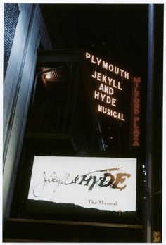 the sign for plymouth jekyll and hyde musical is lit up in the dark