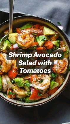 shrimp and avocado salad with tomatoes in a skillet