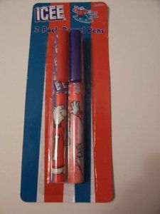 two toothbrushes with hello kitty designs on them in plastic packaging, sitting next to each other