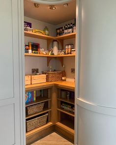 an open pantry with lots of food in it