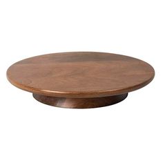 a round wooden table top on an isolated white background