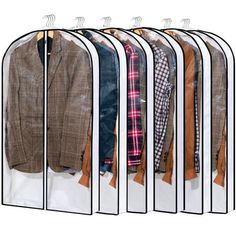 an open closet with clothes hanging on hangers and pants in the middle, all lined up