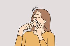 a woman is blowing her nose while holding her hand up to her mouth with both hands