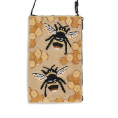 "Stay happy and free just like the bees!  This versatile bag can be used as a crossbody bag, wristlet, or unclipped by the strap to revamp into a purse on the go (just attach to belt loop or larger tote). Includes a convenient zipper enclosure on the side for easy access to cards or a cellphone. Each bag contains a 54\" crossbody strap that can be tucked away when not in use. Our Club Bags are changing the lives of over 1,000 people in Uttar Pradesh, India's poorest state. Your purchase makes a Company Bag, Save The Bees, Pocket Book, Trading Company, Large Bag, Smart Phone, Hand Beading, Large Tote, Phone Bag