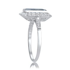 a white gold ring with diamonds on it