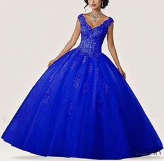 a woman in a blue ball gown