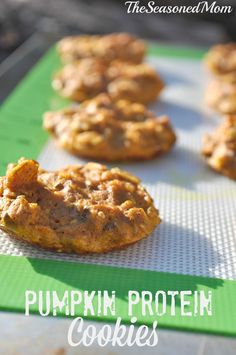 pumpkin protein cookies on a baking sheet with the title text overlay that reads, pumpkin protein cookies