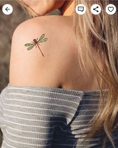 a woman with a dragon tattoo on her shoulder