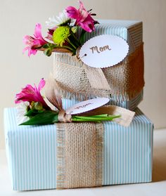 mother's day diy gift wrap with flowers in it and tag on top