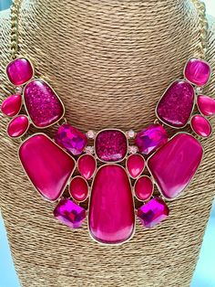 Details: This Geometric Puzzle Necklace features energy that comes from bright, saturated colors. In this case fuschia pink acetate pieces that form an elaborate puzzle, all outlined in gold plate. It's a statement necklace sure to grab attention! This is a design interpreted in a modern way, with an almost tribal feel. Perfect for this season, it's classic with any solid-color top or dress, when you want to be the center of the event! FREE SHIPPING WITH TRACKING  So your jewelry budget isn't eaten up by postage :) All pieces are presented in a lovely organza gift bag. Necklace length: 15" inside, 21"outside measure  Extender: 3" (or 18"-24" with the extender) The  2" coordinating dangling Geometric Puzzle Earrings are sold separately and can be ordered here: https://www.etsy.com/your/shop Bold Pink Jewelry For Gifts, Trendy Pink Resin Jewelry, Rose Red Party Necklace, Vibrant Pink Jewelry For Party, Pink Resin Party Necklaces, Trendy Resin Necklaces For Party, Pink Statement Necklace, Handmade Jewelry Tutorials, Bib Necklaces