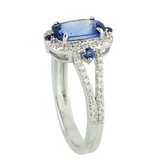 an oval shaped blue sapphire and diamond ring