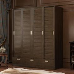 a bedroom with a large armoire next to a bed