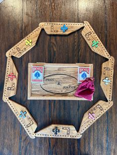 a wooden board game with pieces cut out