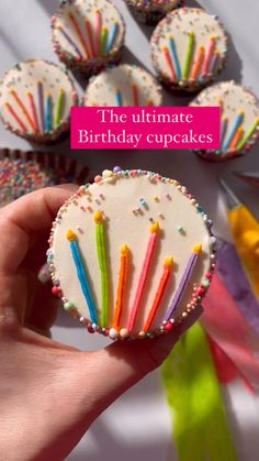 the ultimate birthday cupcakes are decorated with sprinkles and colorful candles