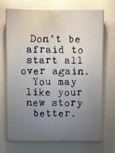 a piece of art that reads don't be afraid to start all over again, you may like your new story better