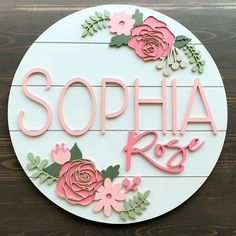 there is a sign that says sophia rose on the side of a wall