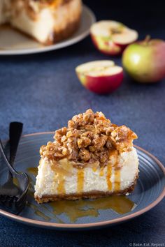 a slice of cheesecake on a plate with caramel sauce and apples in the background