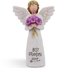 an angel figurine with purple flowers in its hands and the words best grandma ever written on it