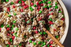 a white bowl filled with cereal and candy