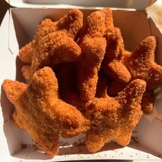 some fried food in a box on a table