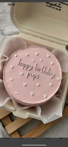 a pink birthday cake in a box with the words happy birthday paps on it