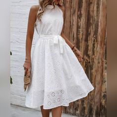 New Flowy Sheer Eyelet Lace Short Halter Dress * Sleeveless * Halter Neck * High Waist * Tie Belt * Flare A Line Skirt * Lined Short Skirt *Approximate Unstretched Measurements* Small (4) * Bust 37.5" * Waist 25.25"(Up To 27") *Length 43" Medium (6) * Bust 39" * Waist 26.75"(Up To 29") *Length 43.25" Large (8/10) * Bust 41.25" * Waist 29"(Up To 31.5") * Length 43.5" Xl (12) * Bust 44" * Waist 31.5"(Up To 34") * Length 44" In Transit ** Will Ship In 5 -10 Days Color : White Fabric : Flowy Poly #F Medium White Dress, Elegant Sleeveless Sundress For Garden Party, White Sleeveless Halter Dress For Garden Party, Feminine Sleeveless Halter Dress For Day Out, Feminine Sleeveless Halter Dress For Garden Party, Feminine Sleeveless Knee-length Beach Dress, Elegant Sleeveless Halter Dress For Garden Party, Feminine Knee-length Sleeveless Beach Dress, Elegant Knee-length Halter Dress For Day Out