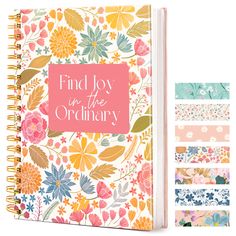 a notebook with flowers and the words find joy in the ordinary