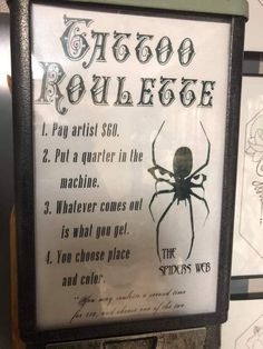 a sign with an image of a spider on it