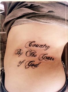 a woman's stomach with the words country by the grace of god on it