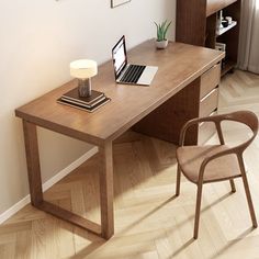 a laptop computer sitting on top of a wooden desk next to a lamp and chair