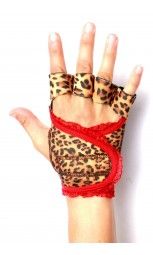 a woman's hand with leopard print and red lace on it, holding up her wrist