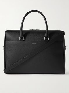 SAINT LAURENT's briefcase is a refined classic that's been perfected over the decades. Crafted from black full-grain leather, it has a structured silhouette that's smart and sleek. Use it to elevate your workwear repertoire. Timeless Textured Leather Briefcase For Business, High-end Top Handle Business Briefcase, High-end Top Handle Briefcase For Business, High-end Business Briefcase With Top Handle, Saffiano Leather Briefcase With Palladium Hardware, Saffiano Leather Briefcase With Palladium Hardware For Business, Elegant Textured Leather Briefcase For Business Trips, Luxury Textured Leather Briefcase For Business Trips, Classic Saffiano Leather Briefcase With Palladium Hardware