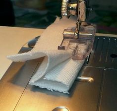 a sewing machine with a piece of cloth on it