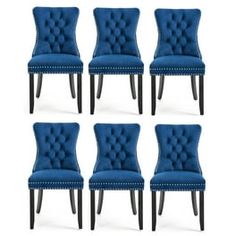 six blue velvet dining chairs with studded legs