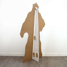 a cardboard cut out of a horse head and tail