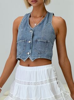 Denim vest top V-neckline, twin front pockets, contrast stitching, silver-toned button fastening down front Non-stretch, unlined 100% cotton Cold gentle wash Denim Vest Style, Casual Chic Denim, Denim Vest Top, Womens Party Tops, Womens Denim Vest, Purple Bodysuit, Vest Blouse, Denim Blouse, Festival Tops