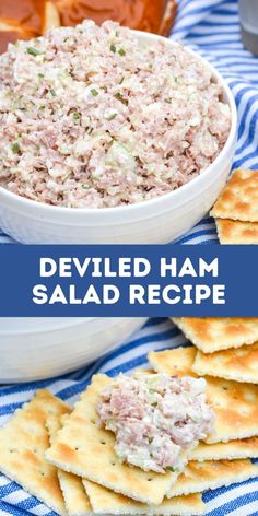 a bowl filled with ham salad next to crackers