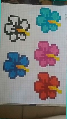 a piece of paper with some pixel art on it's side and an image of flowers in the middle