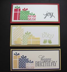 three cards with different designs on them and one has a gift box in the middle