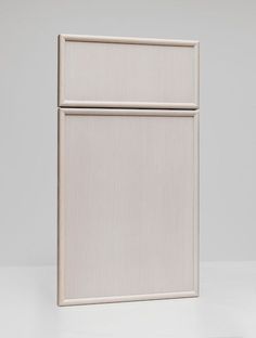 a white refrigerator freezer sitting on top of a counter