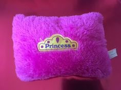 This is a 10-inch Princess Pillow Toy, perfect for children who love stuffed animals. The toy is pink in color and is designed to look like a princess. It is soft and cuddly, making it a great companion for bedtime or playtime. Princess Pillow, A Princess, 10 Inch, Stuffed Animals, Pillows, Toys, 10 Things, Animals, Pink