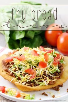 a taco salad on top of tortilla bread