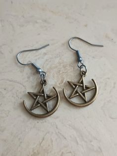 Delicate Intricate Detailed Half Moon Pentagram Drop Earrings for the Everyday Witch lover. For the Witchy Minimalist. Super Cute with a Bronze tone Finish. Witchy Minimalist, Moon Pentagram, Witchy Earrings, Half Moon, Jewelry Earrings Dangle, Etsy Earrings, Dangle Drop Earrings, Witch, Etsy Accessories