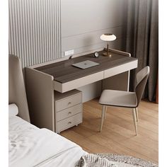 a desk with a laptop on it in a room