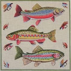 three fish cross stitch pattern on a white background with green trimmings and red, yellow, blue, pink, orange