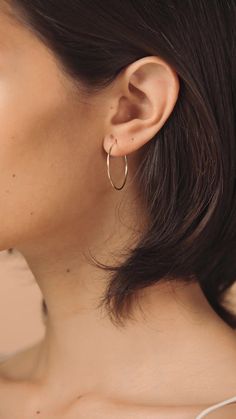 Our large gold hoop earrings are dainty and classic, making them perfect for everyday wear. Hoops measure at 30mm Classic Small Hoop Earrings In 14k Gold Filled, Classic Round Hoop Earrings For Everyday, Classic Circle Earrings For Everyday, Elegant Everyday Circle Huggie Earrings, Elegant 14k Gold Filled Circle Hoop Earrings, Delicate Everyday Hoop Jewelry, Minimalist Everyday Hoop Earrings, Elegant Hypoallergenic Hoop Earrings For Everyday, Simple Hypoallergenic Hoop Earrings For Everyday