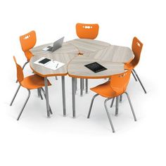 a round table with orange chairs around it and a laptop on the center one side