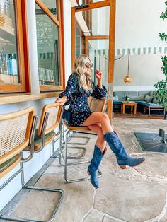 Outfits With Blue Cowgirl Boots, Babydoll Dress Cowboy Boots, Square Cowboy Boots Outfit, Night Out Cowboy Boots Outfit, Outfits With Blue Boots, Modest Cowboy Boots Outfits, Idyllwind Boots Outfit, Dress And Cowboy Boots Outfit Wedding Guest, Bodycon Dress Cowboy Boots