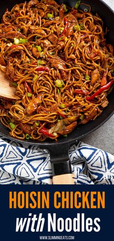 chicken with noodles in a skillet on top of a blue and white towel next to a wooden spoon